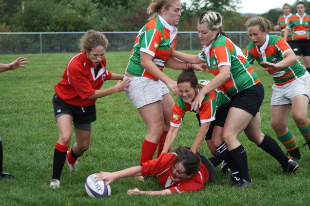 Wisconsin scrumhalf Rebecca "Reba" Stillman looks for the pick-and-go on a quick ruck set by flanker Sarah Whaley. 