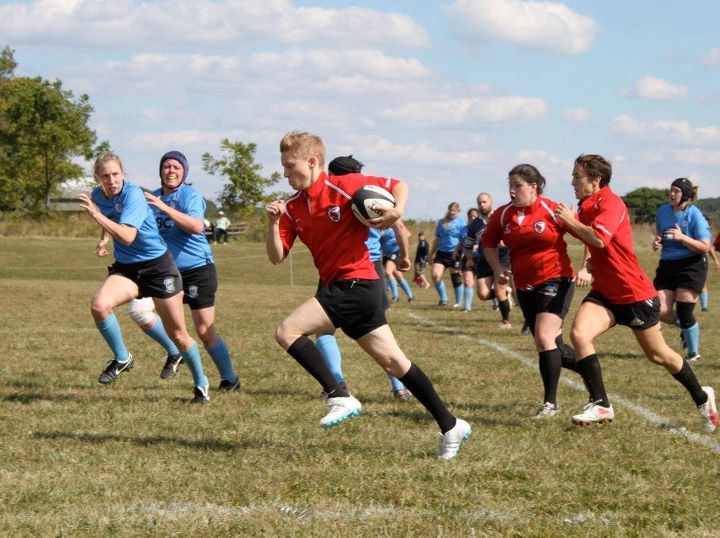 Wisconsin's Emily Frerichs races downfield with the ball against the Milwaukee Scylla.